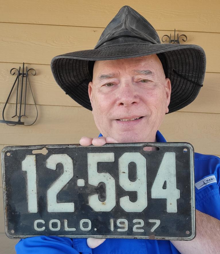 Man shares story of traveling 1927 license plate | Department of